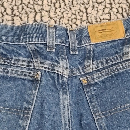 Light blue high-waisted L.L.Bean mom jeans with front pockets, belt loops, and brown leather L.L.Bean patch on waistband.