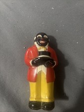 Made In The Usa, Black Man Holding A Hat In A Red Suit With Yellow Pants