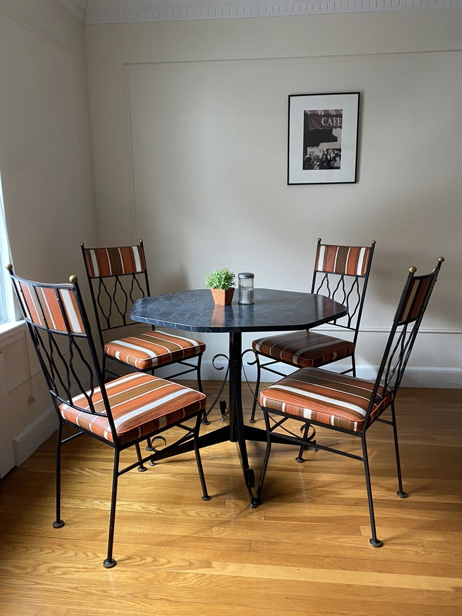 wrought iron dining room table and chairs