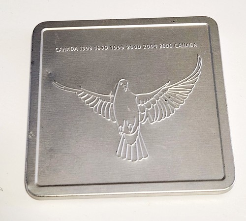 1999 2000 CANADA MILLENNIUM KEEPSAKE COIN IN TIN (NO STAMPS)