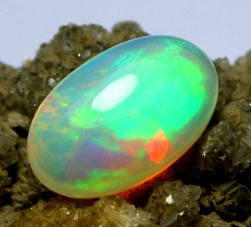 4.25 Carat CERTIFICATION NATURAL ETHIOPIAN OPAL FLASH MULTI FIRE LOOSE GEMSTONE - Picture 4 of 12