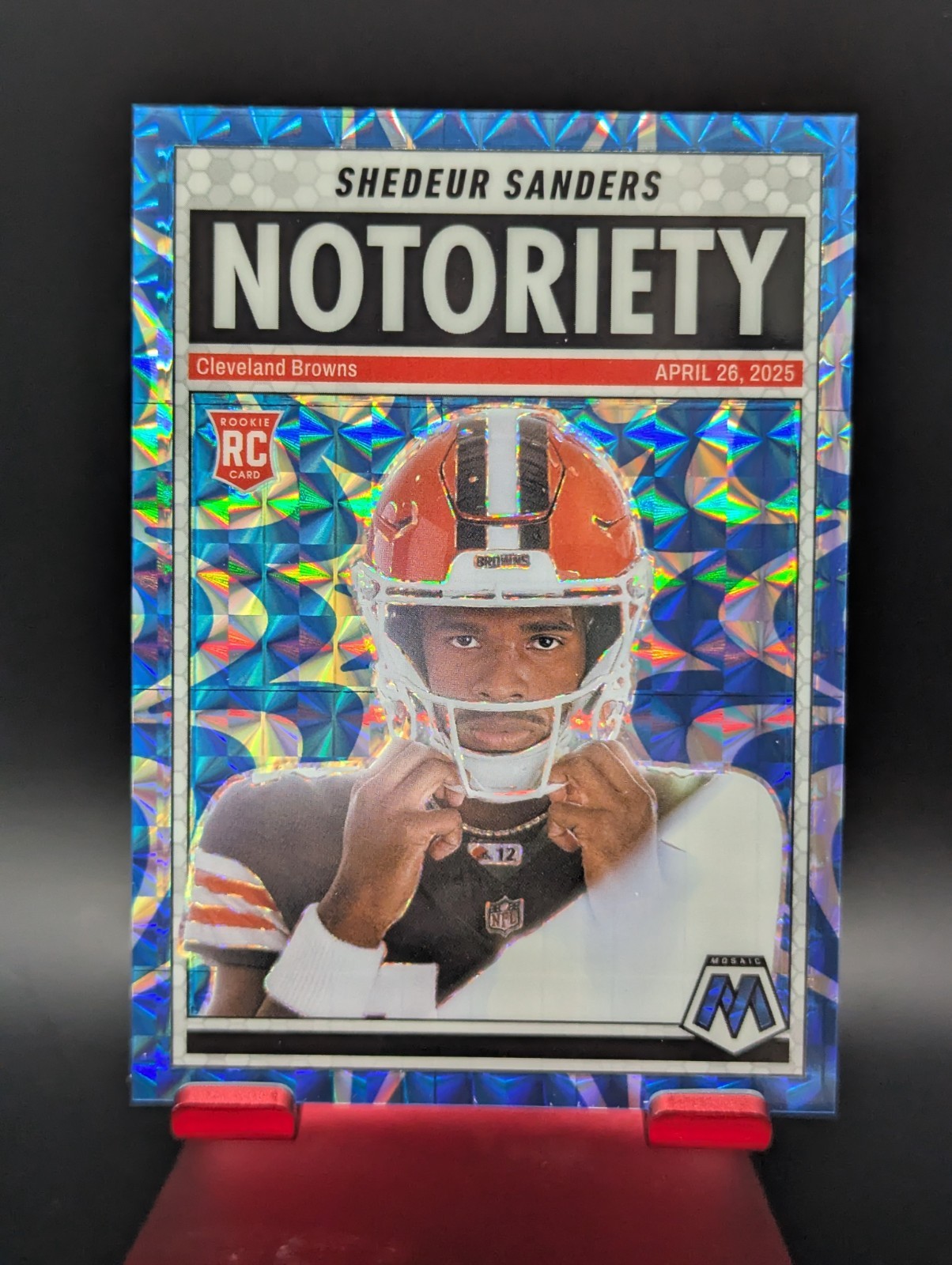 2025 Panini Mosaic RC Shedeur Sanders Notoriety Blue Reactive #/99 Browns