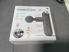 Sharper Image Powerboost Move Massage Gun, 4 Speeds, 4 Heads, Cordless