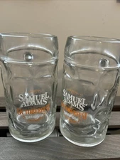 (2) SAM ADAMS OCTOBERFEST  BEER MUG GLASS STEIN Thumbprint RAISE THE STEIN
