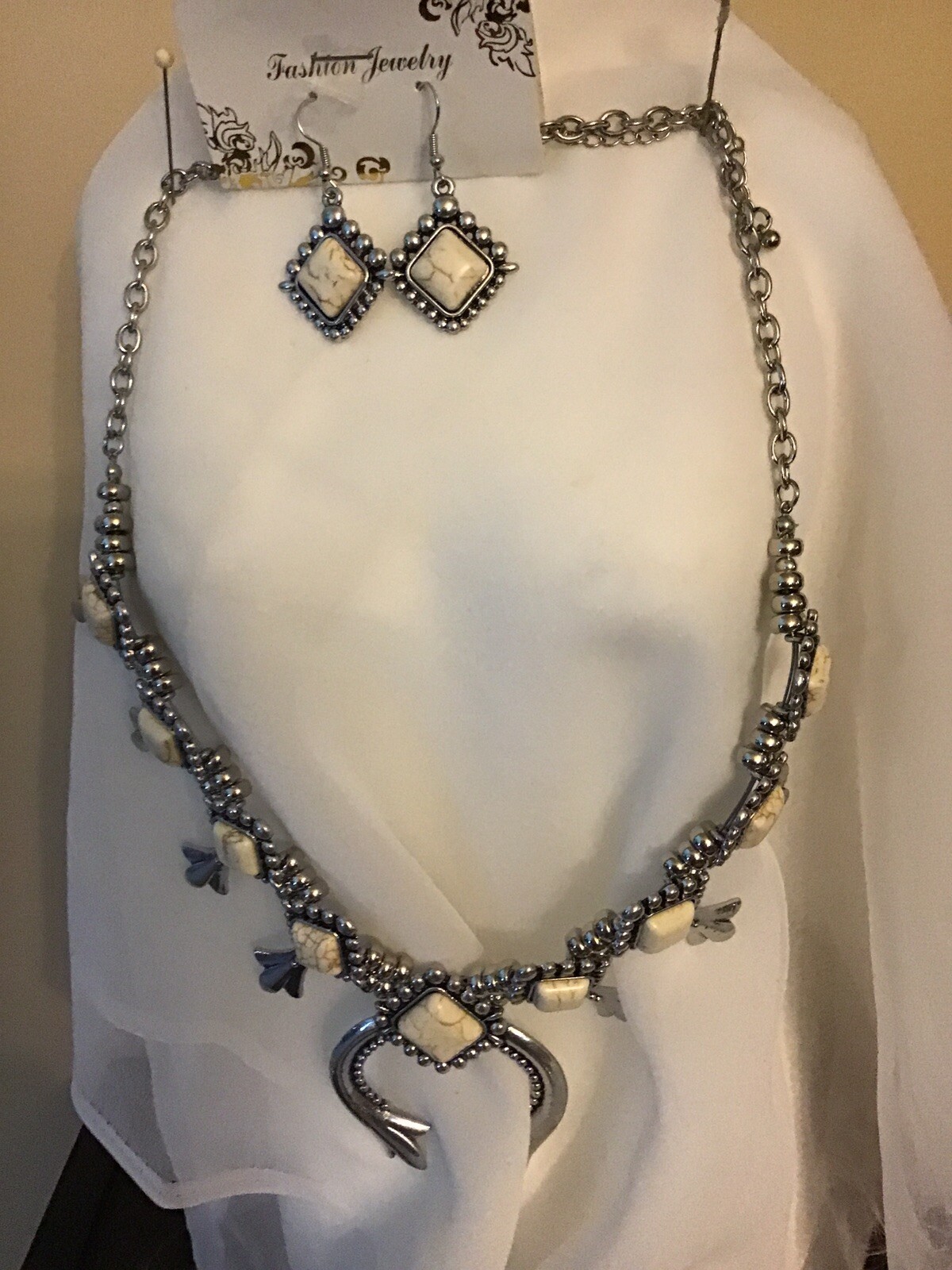 🤠 Squash blossom white howelite necklace and earings eBay