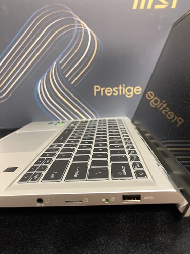 Computadora portátil MSI Prestige 14 H B13UCX plateada 14" FHD+ pantalla 32 GB RAM 1 TB almacenamiento - Imagen 6 de 12