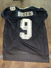Drew Brees Autographed Black Football Jersey Beckett And Bree’s Cert Sticker