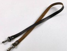 Pasek prawdopodobnie Czerwony Krzyż lub podobny. Kawałek nieoczyszczony, długość 109c