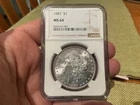 1887 Morgan Silver Dollar MS64 NGC