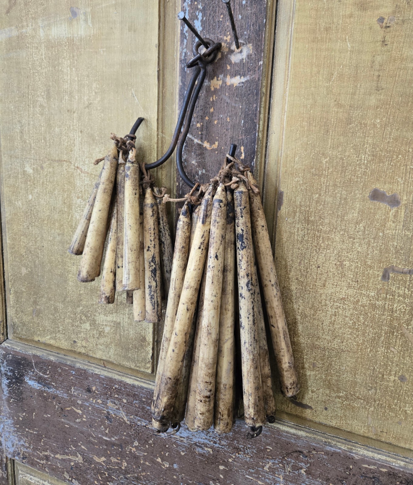 made to look early faux tallow candles