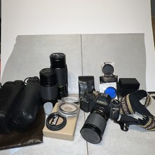 Canon T50 Camera BUNDLE  , 3 Lens, Cases, Flash, Filters, Etc.    READ DESCRIPTION