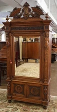 19th Century Italian Carved Walnut Figural Renaissance Revival Wardrobe Armoire