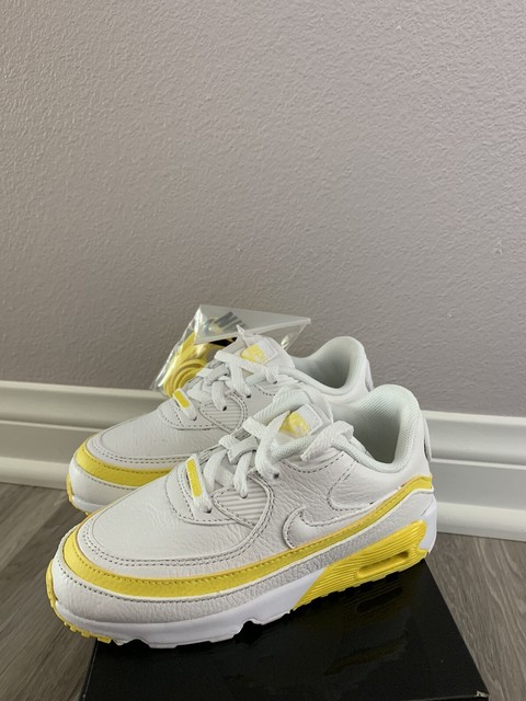 yellow nike girl shoes