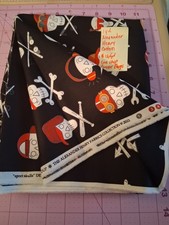 Alexander Henry Juvenile Skull cotton Fabric