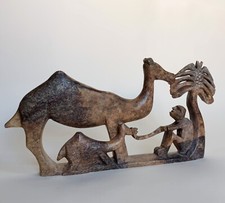 Sculpture marocaine. Chameau et chamelier. Travail Berbère, Marrakech, 20è s