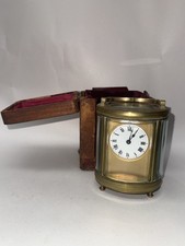 UNUSUAL ANTIQUE BRASS & GLASS OVAL CASED CARRIAGE CLOCK - WORKING