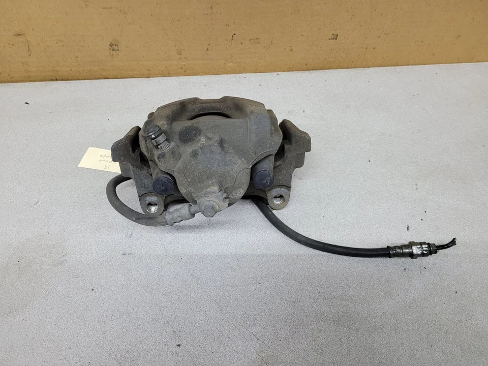 PINZA DE FRENO DELANTERA IZQUIERDA VOLKSWAGEN PASSAT 2012-2014 OEM Foto 2 de 3