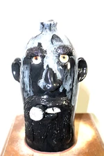billy joe craven , face jug, pottery,  pottery 11'' TALL  X 7'' WIDE