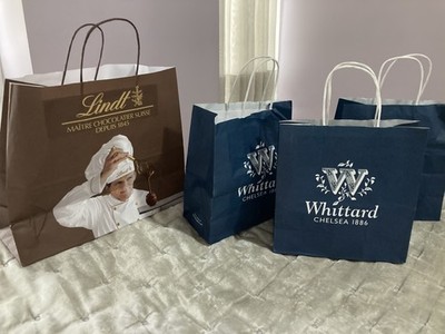 Set Tee Whittard Chelsea & Schokolade Lindt Chocolatier Suisse leere Geschenktüten