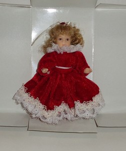 porcelain doll red velvet dress