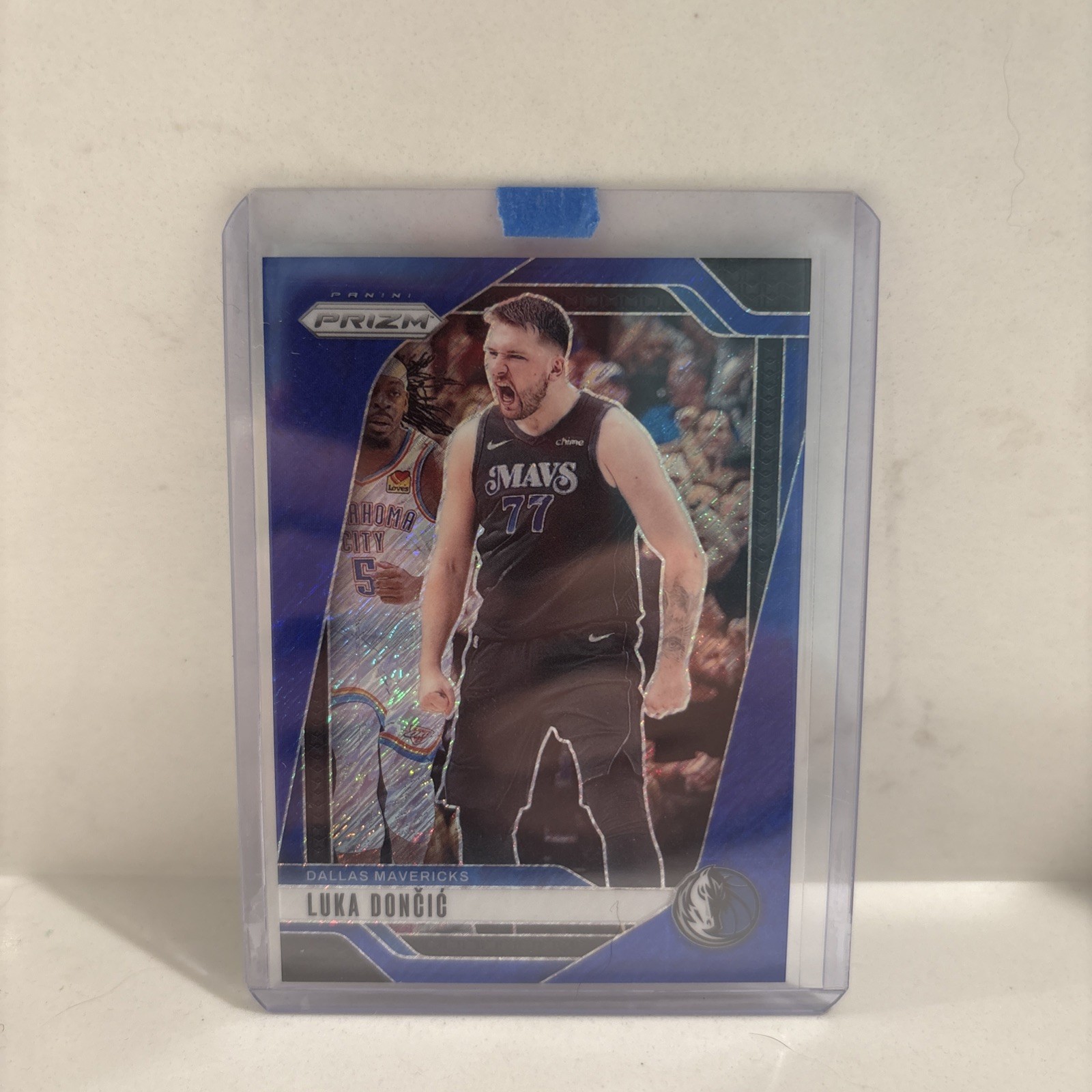 Luka Doncic 2024-25 Prizm #89 Blue Shimmer Prizm /35 Dallas Mavericks