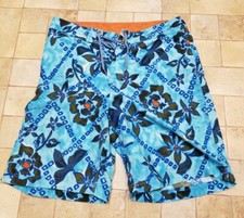 RARE VTG 90s 34-36 HURLEY INTERNATIONAL FLORAL PRINT SURF BOARDSHORTS USA