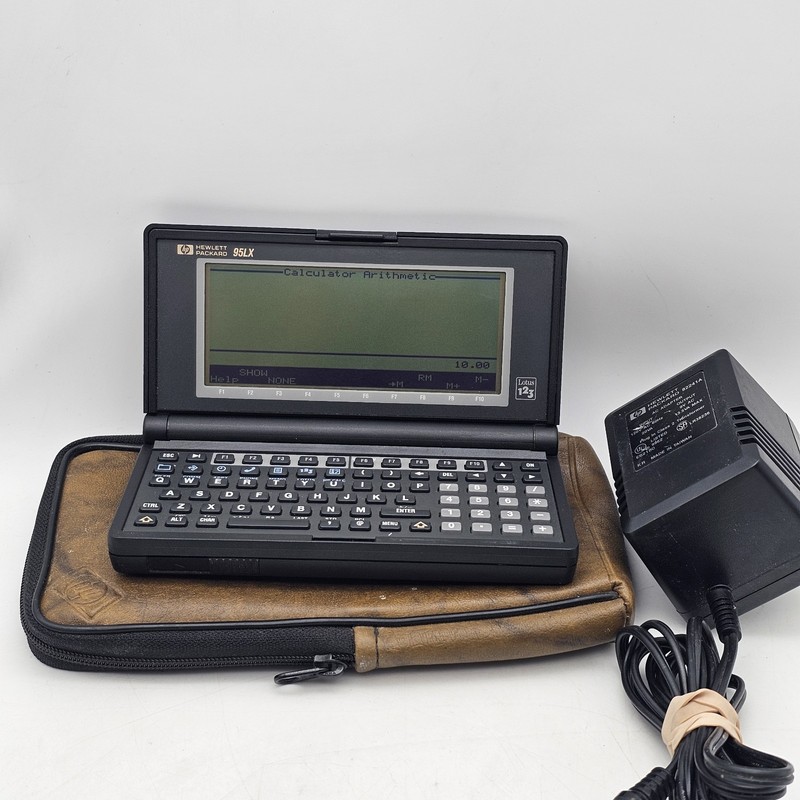 Vintage HP 95LX Palmtop Handheld Pocket Computer with Lotus 123  W/ AC Adapter