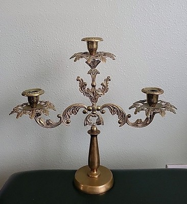 vintage 3-arm brass candelabra, designed to hold three candles. 13.5'' Tall,heavy