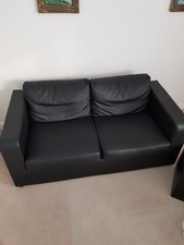 black two seater leather sofa bed used