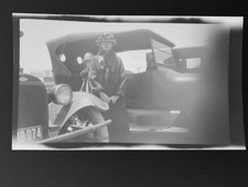 Antique Woman Posing Chevrolet 1920s Negative Grille Headlights License Plate Antique Woman Posing Chevrolet 1920s Negative Grille Headlights License Plate