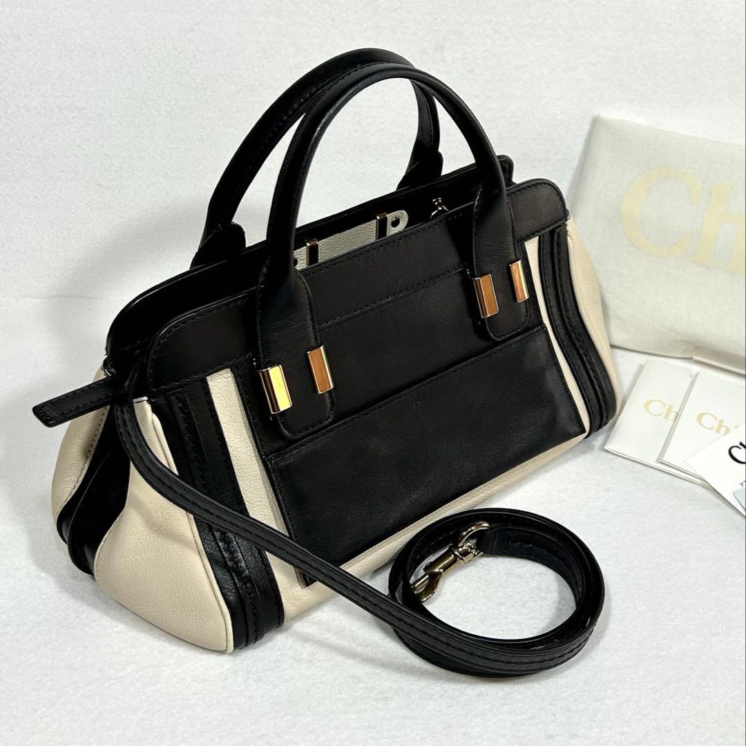 Chloe Navy Blue Canvas Leather Tote Bag with Embossed Logo and Shoulder Strap