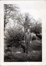 WW2 Photo of Soldier Standing in Yard with Trees
