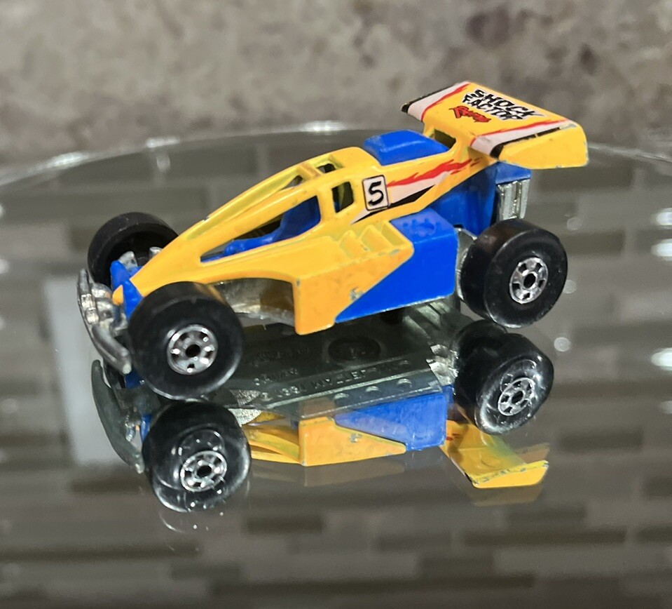 1991 Hot Wheels Shock Factor Racing Blue & Yellow Diecast Car Scale 1/64 Loose
