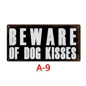beware of dog kisses sign