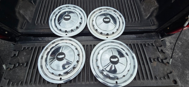 LOT OF 4 VINTAGE 1957 CHEVROLET BEL AIR HUBCAPS / WHEEL COVERS - VERY NICE !