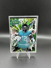 2025 Travis Hunter /4 Rookie Wild Card Splat. rookie card picture