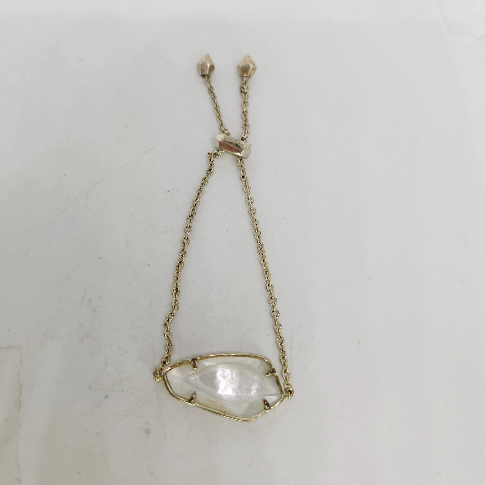 Brazalete Bolo Ajustable Kendra Scott Cambel Tono Dorado Blanco Madreperla Foto 2 de 4