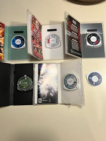 Sony PSP Console w/ AC Adapter, Memory Stick Duo, UMD Games & Movies