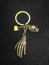 Silvertone Skull And Skeleton Keychain