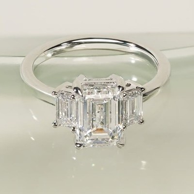 3.90CTW Emerald Cut Moissanite Three Stone Engagement Ring 14K White Gold Plated