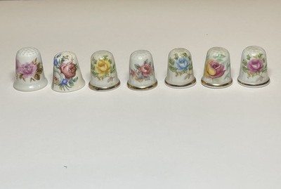 Porcelain Thimbles; Set Of 7, Each Thimble Features A Different Beautiful Rose.