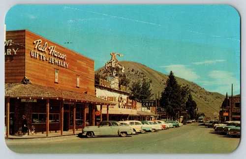 Postcard - Vintage Jackson Hole Wyoming w Storefronts Neon Signs & 1940 Cars