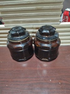 VINTAGE DARK AMBER GLASS APOTHECARY JARS WOTH LIDS STARBURST PATTERN DESIGN 4"
