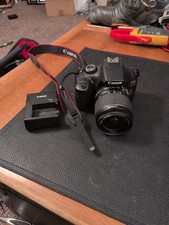 Canon EOS Rebel T6 DSLR Camera  18-55mm Lens  Battery and Charger Included