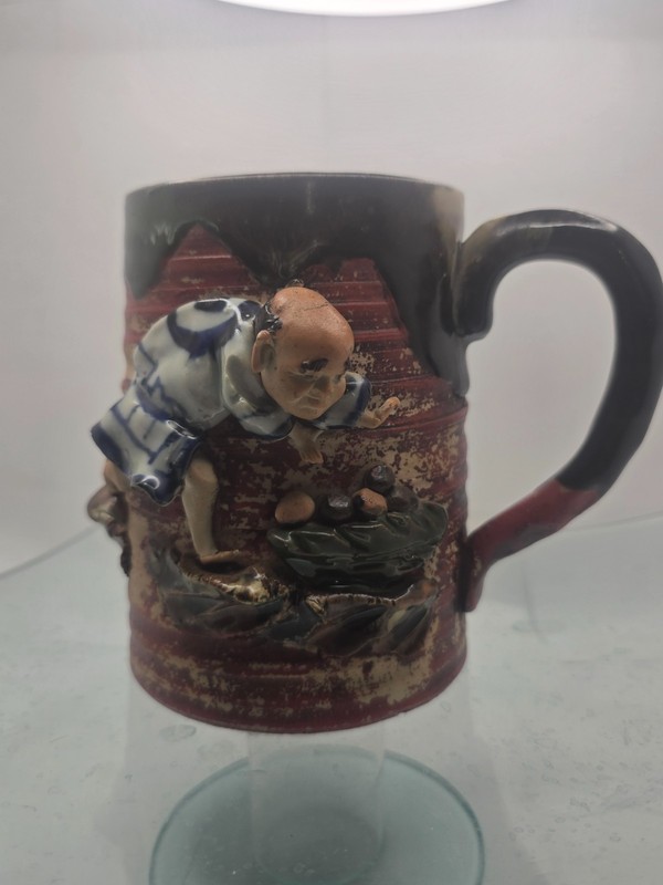 19/20TH C Japanese Sumida Gawa Mug-Man with White Bottle