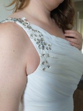  New wedding dress never been worn. White size 12.