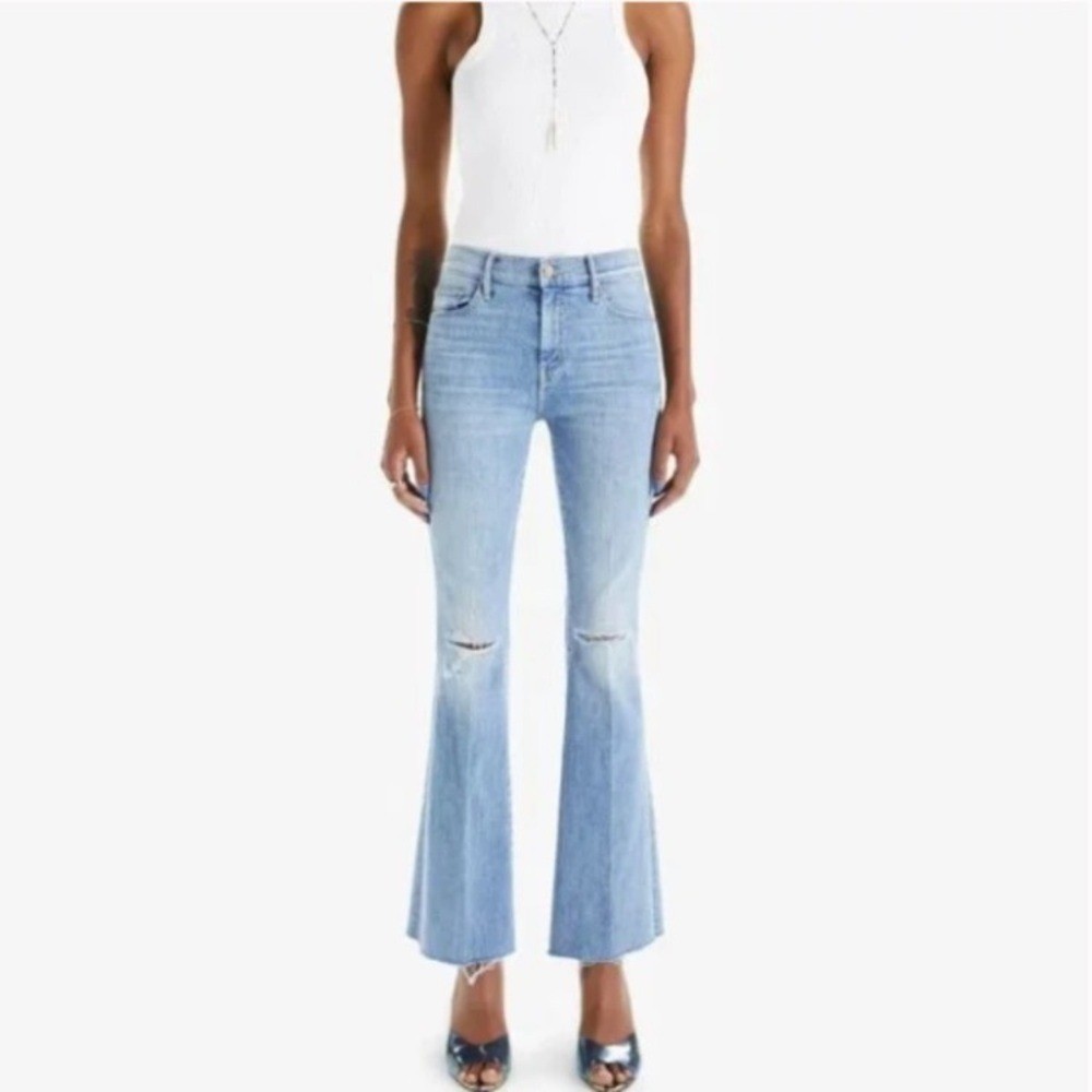 Mother The Weekender Fray Flare Jeans in action shot 26 distressed raw hem