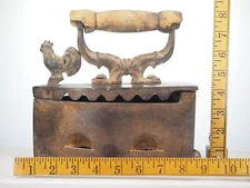 Antique cast iron coal fired clothing iron