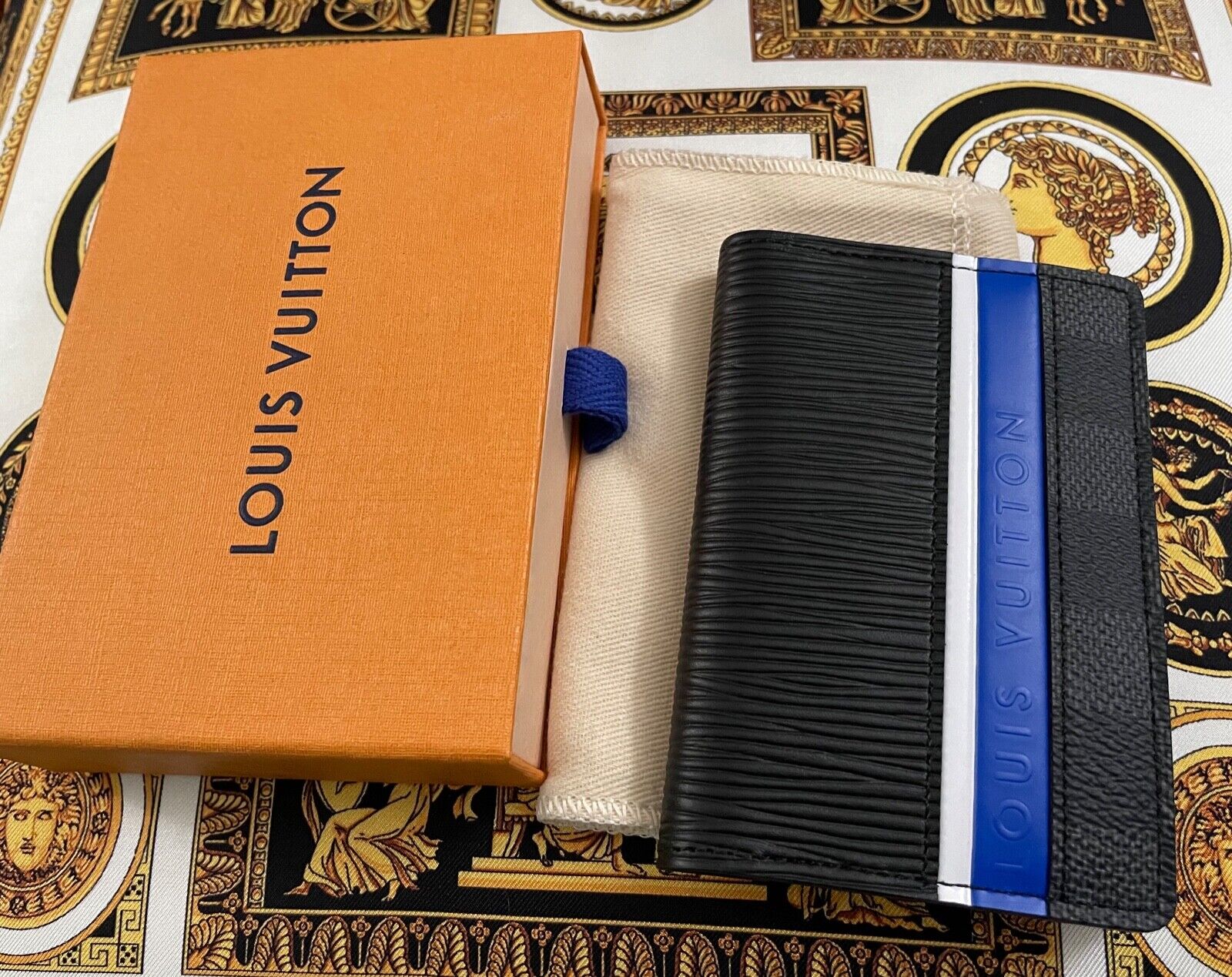 blue and white louis vuittons wallet