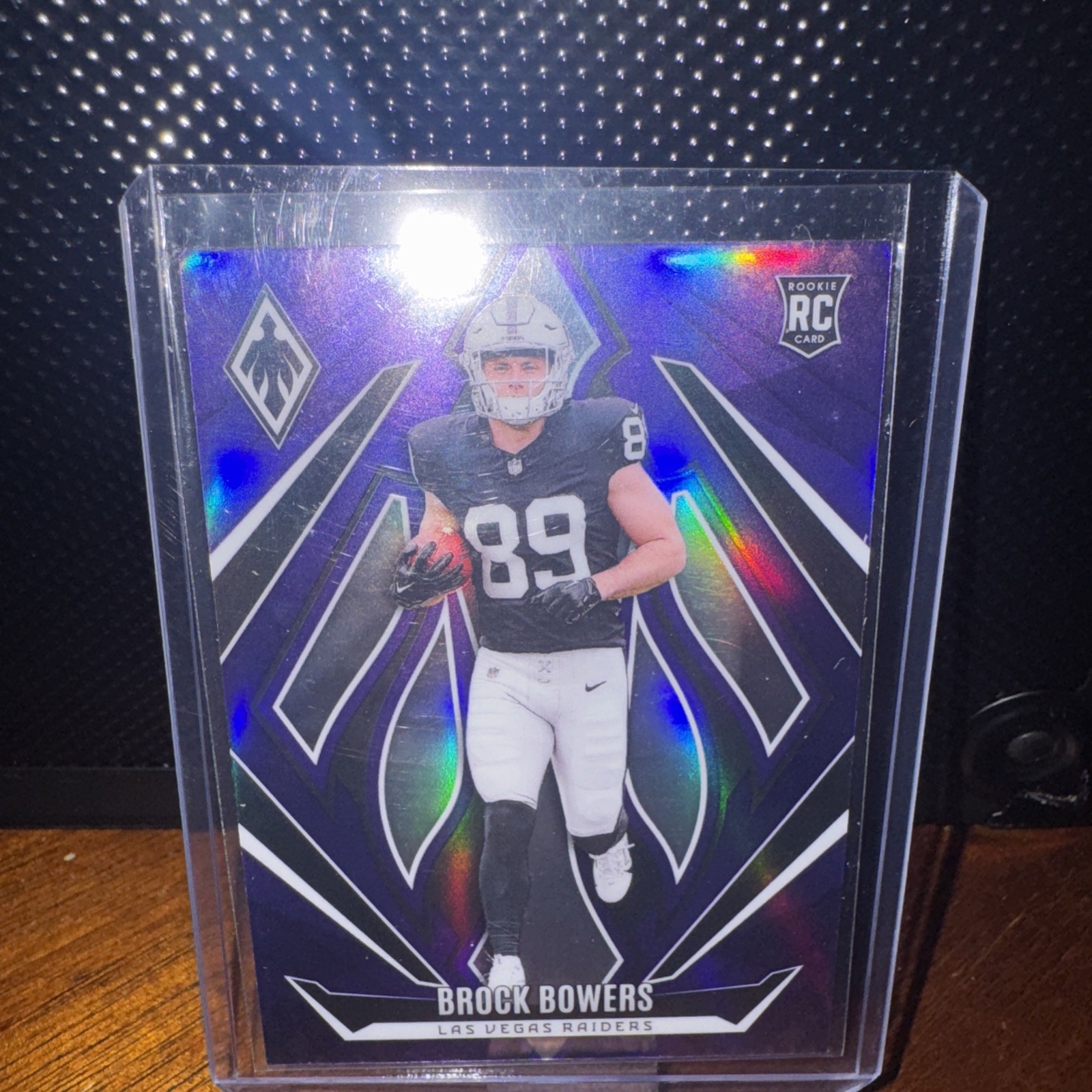 2024 Panini Phoenix - Rookies Brock Bowers #165 Purple Prizm (RC)